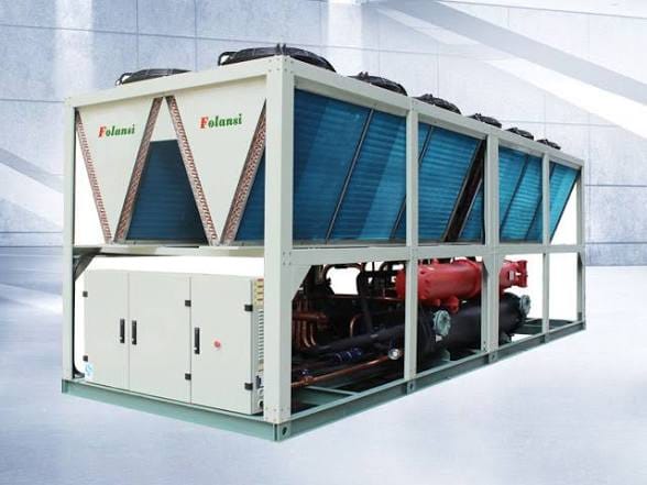 Large modular air-cooled chiller unit with multiple fans ready for commercial installation
